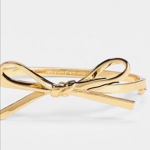 Never worn Kate Spade bow bracelet gold